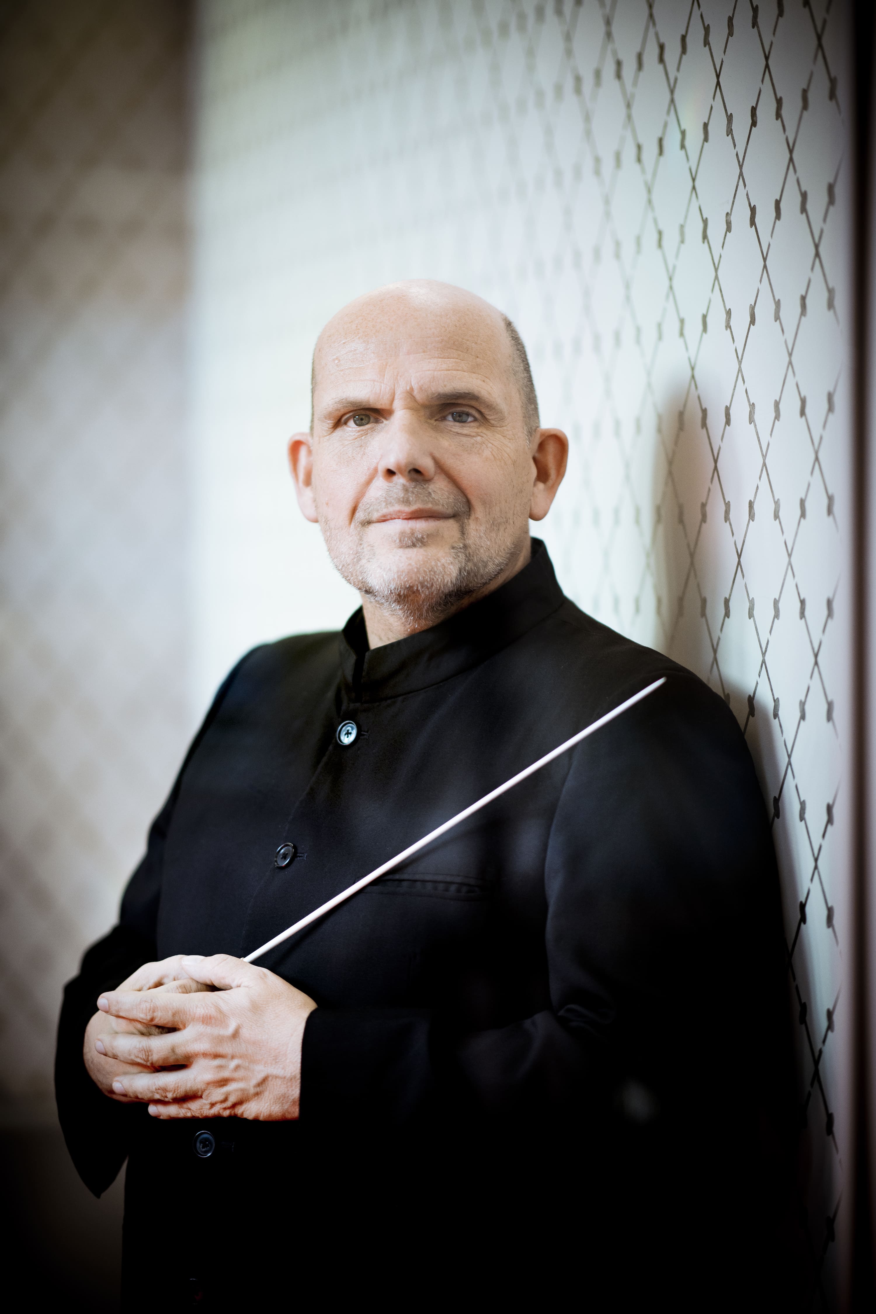 Renowned conductor Jaap van Zweden leads the Evergreen Symphony Orchestra, revealing the power and spirit of Shostakovich.