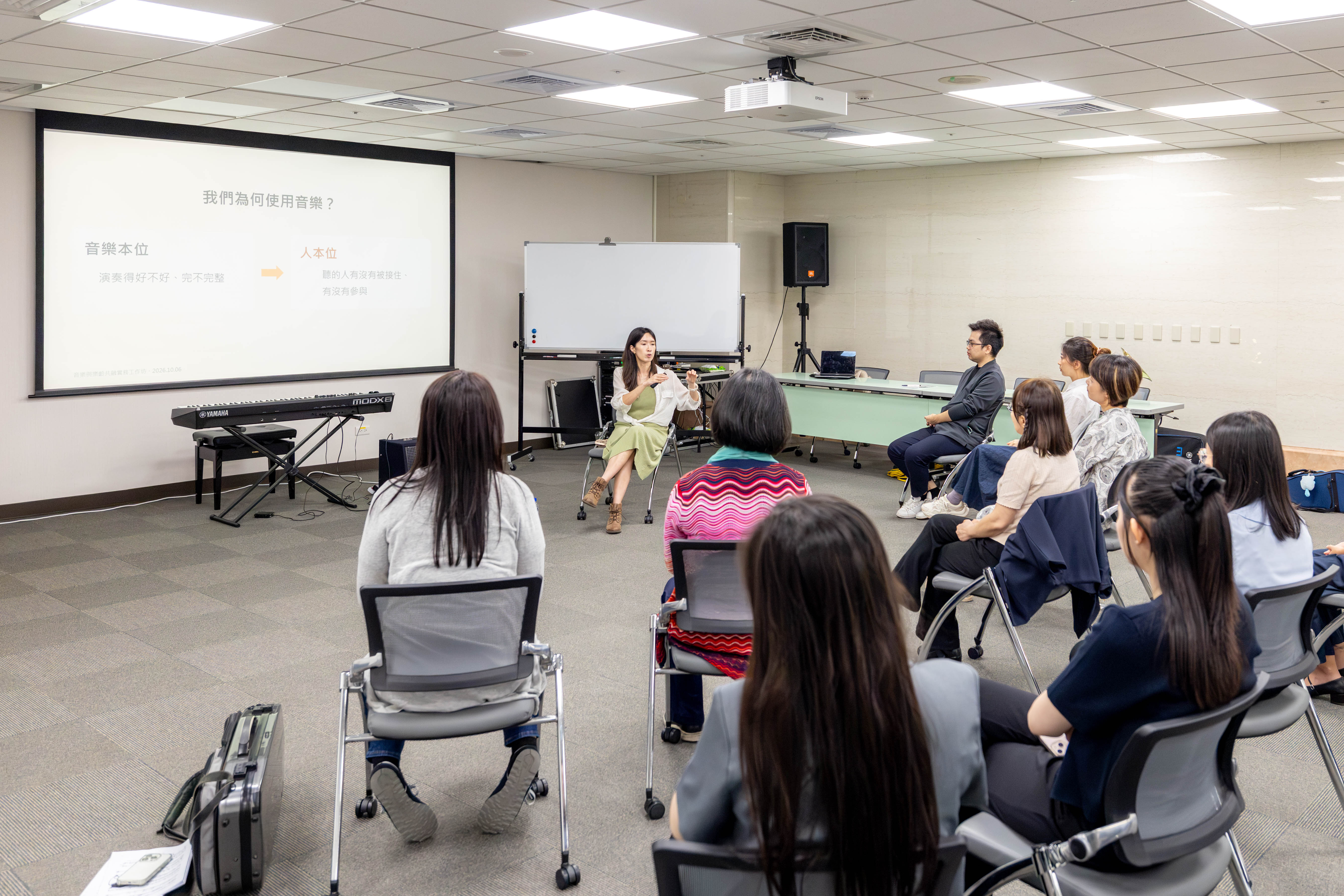 Yvonne Kuo introduced foundational concepts of music-based support, focusing on participant-centered approaches to musical interaction and activity design.